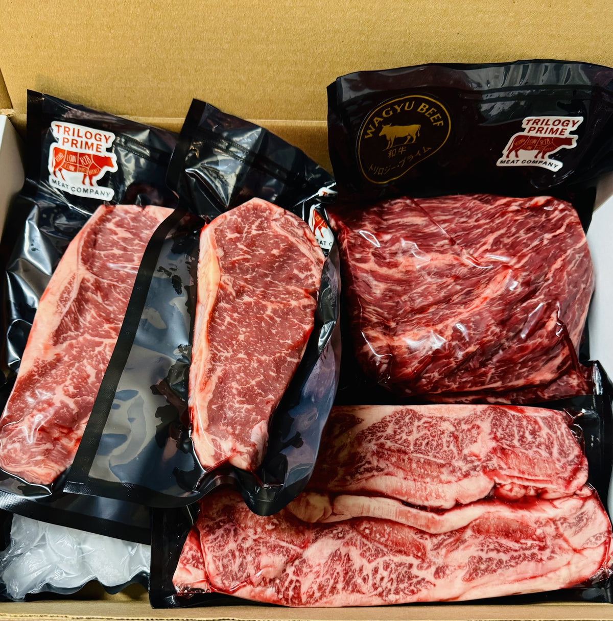Trilogy Prime box packed with Wagyu NY strips and short ribs